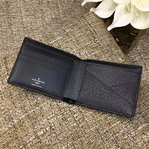 multiple wallet louis vuitton taiga leather|louis vuitton multiple card holder.